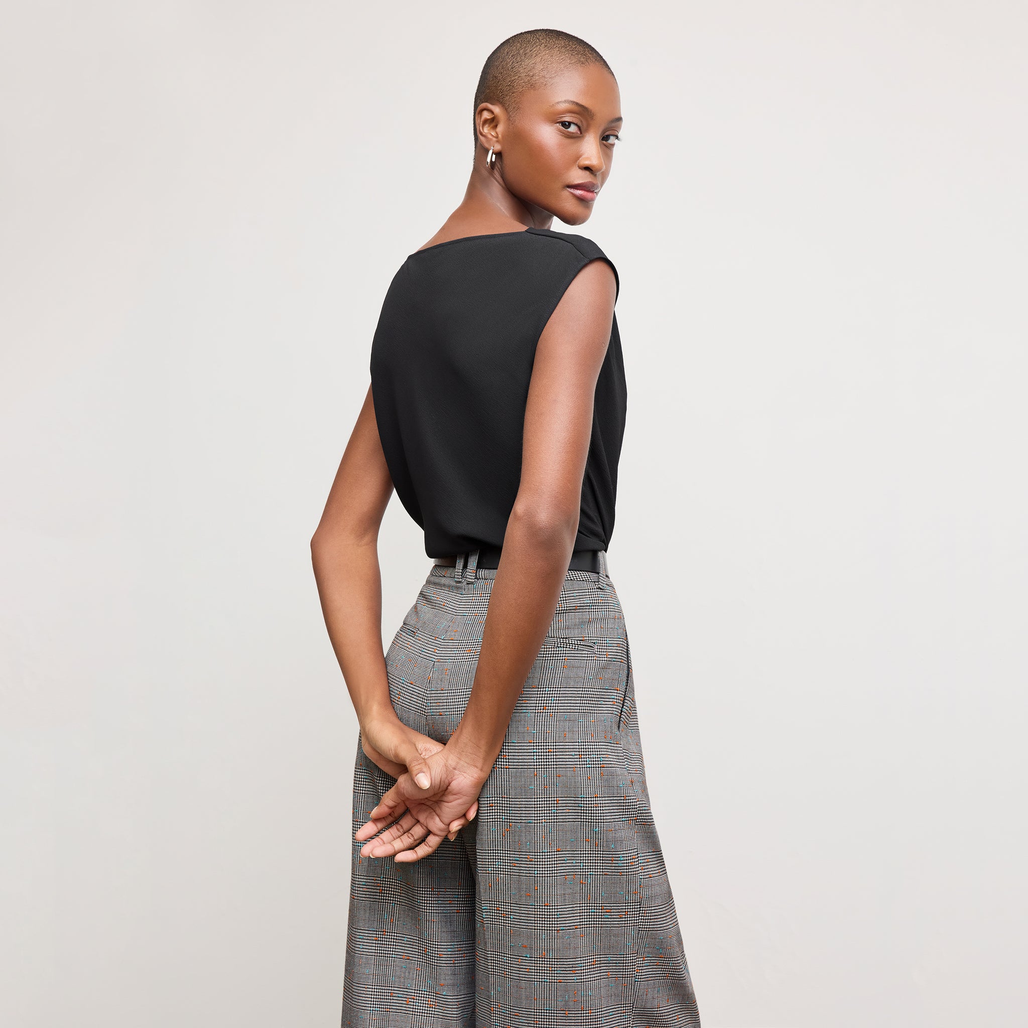 back image of a woman wearing the Nora Top in Black