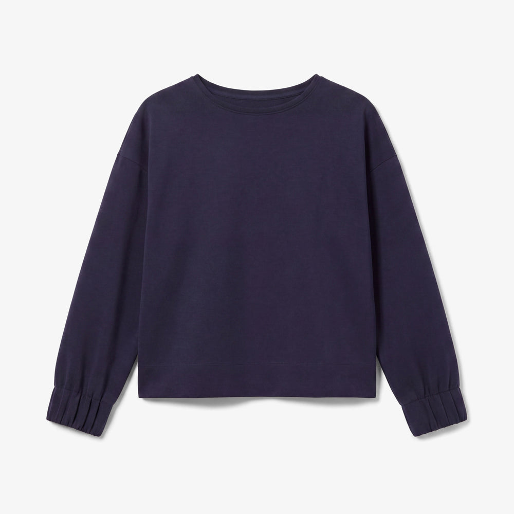 A dark purple long-sleeve crewneck sweatshirt with gathered cuffs, shown flat against a light gray background.