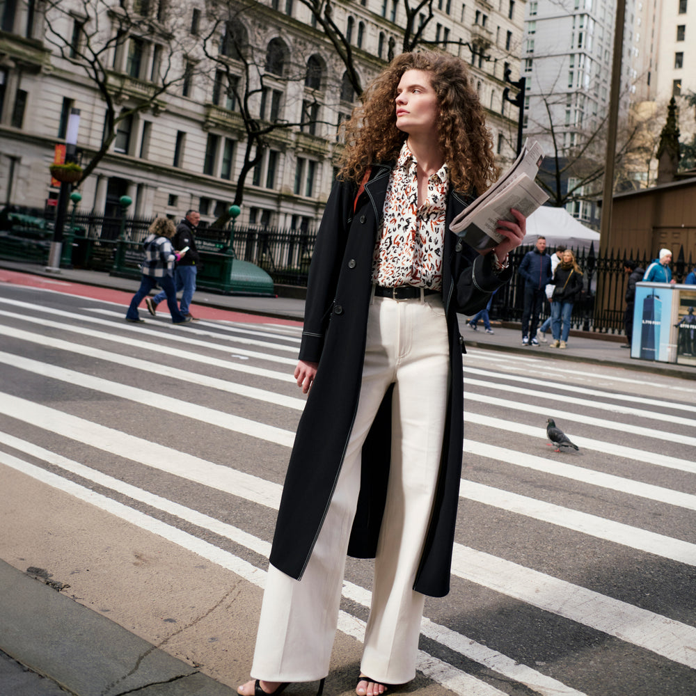 Front image of a woman wearing the Milo Jean in Tusk