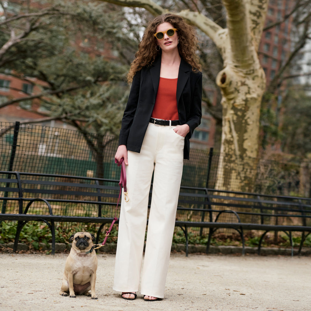 Front image of a woman wearing the Milo Jean in Tusk