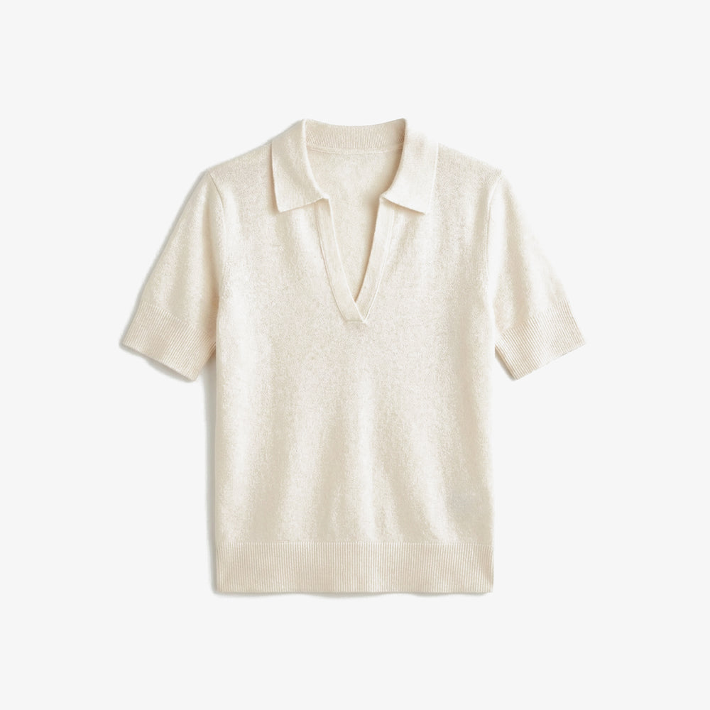 Beige short-sleeve shirt on a white background
