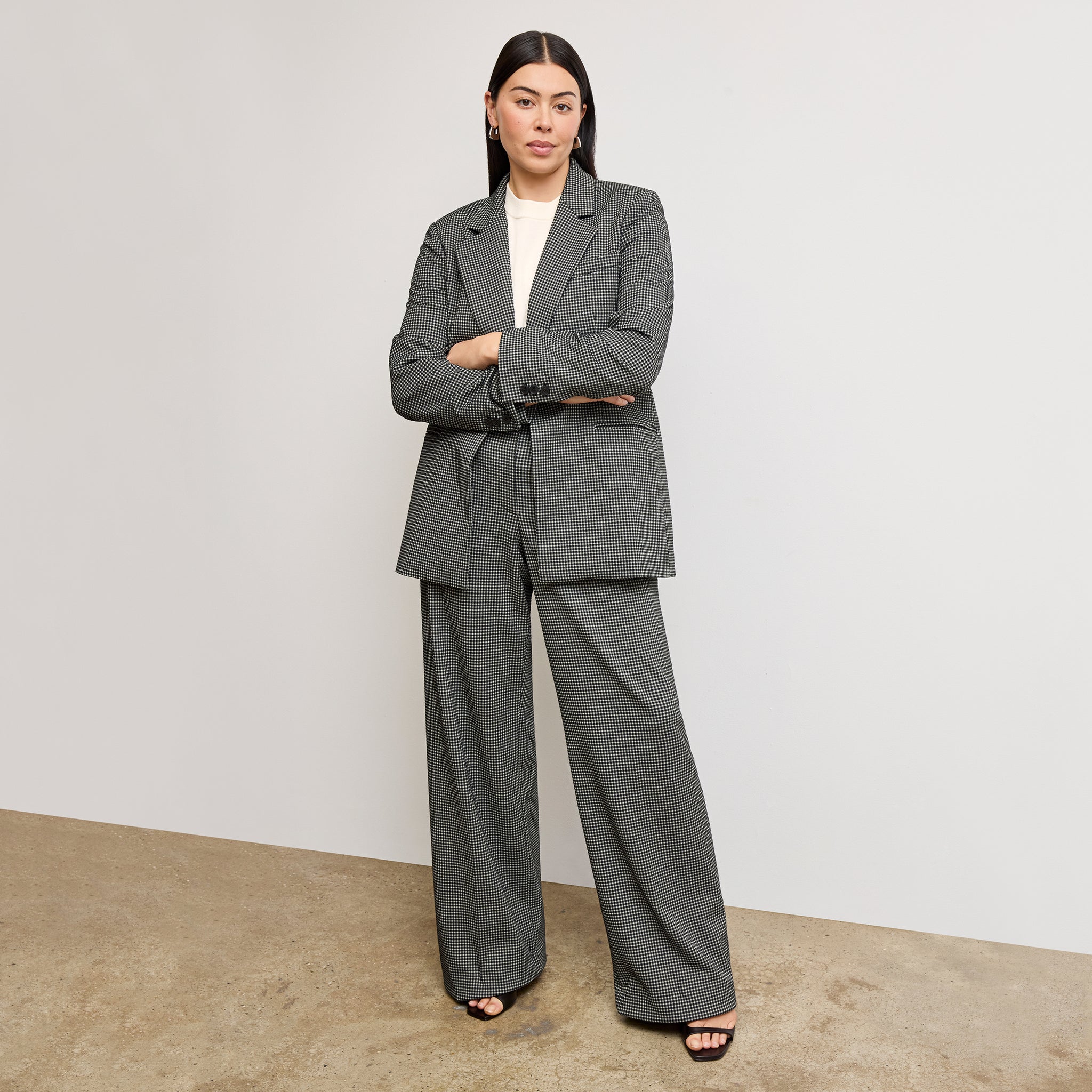 front image of a woman wearing the Tinsley Trousers in Classic Check 