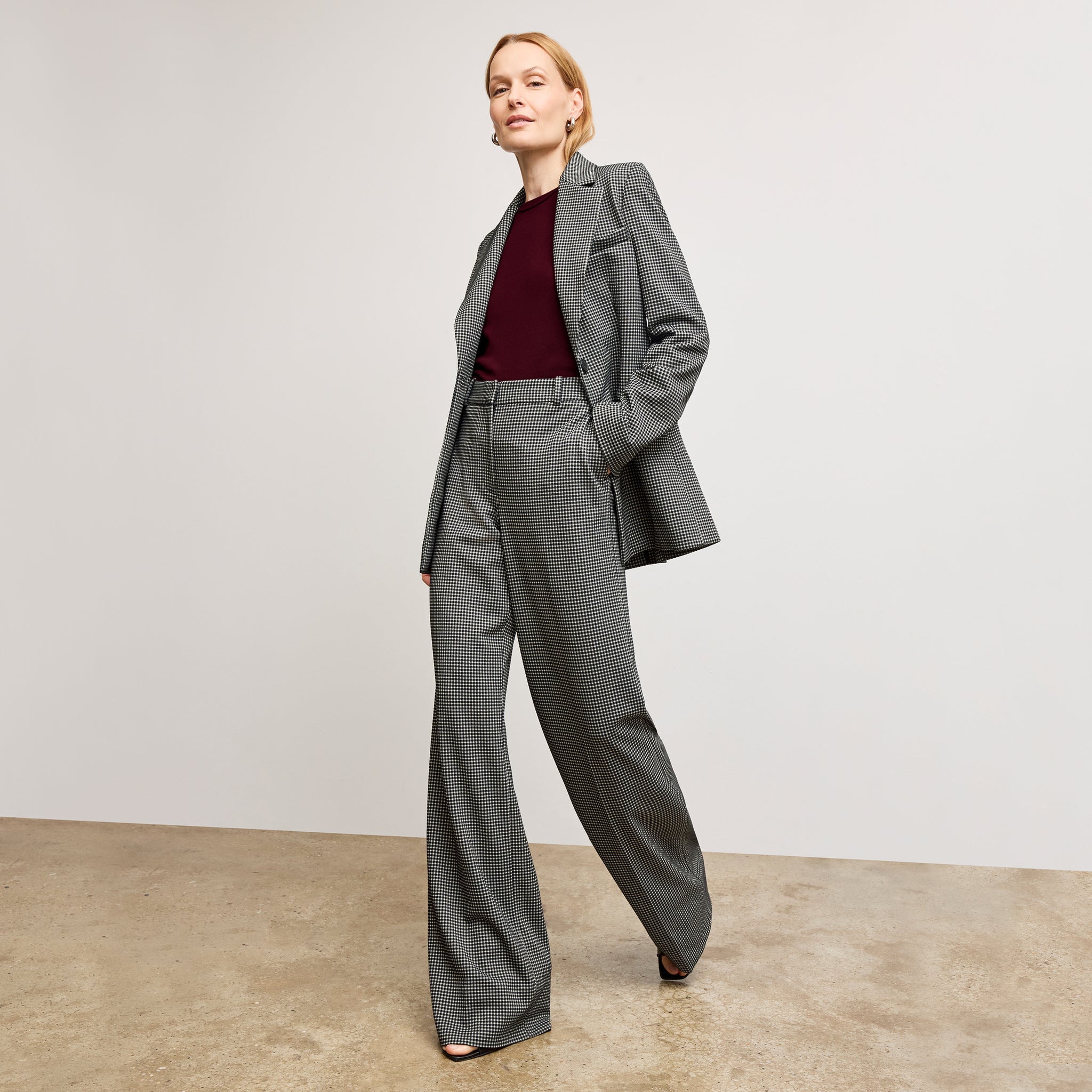 front image of a woman wearing the Tinsley Trousers in Classic Check 