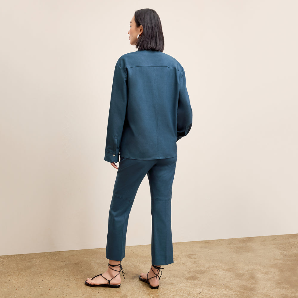 back image of a woman wearing the russell top in bluebell