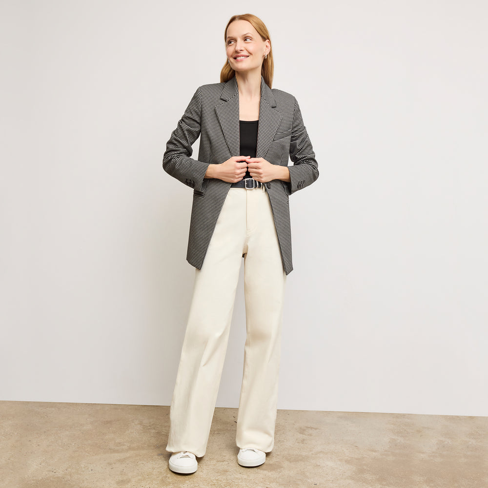 front image of a woman wearing the sabine top in black