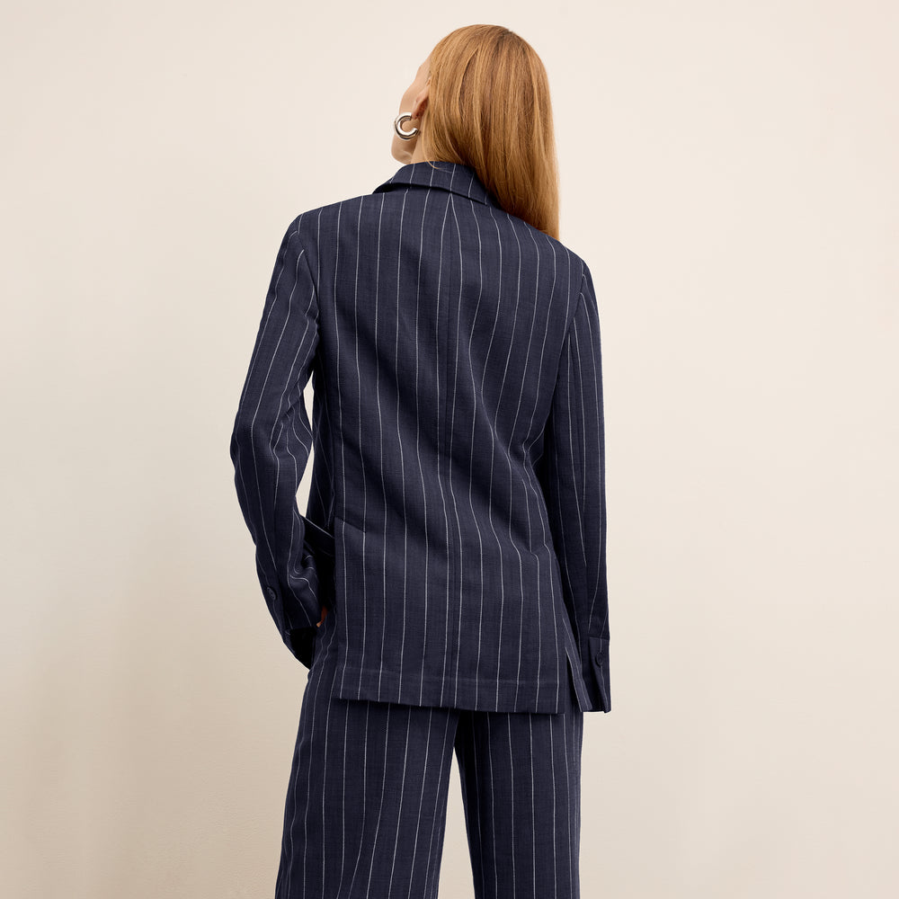 Back image of a woman wearing the Teddy Jacket in Porto Weave