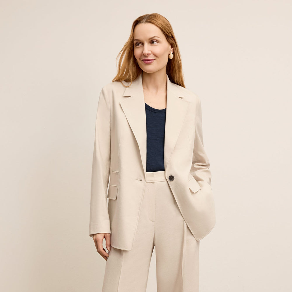 front image of a woman wearing the teddy jacket in natural