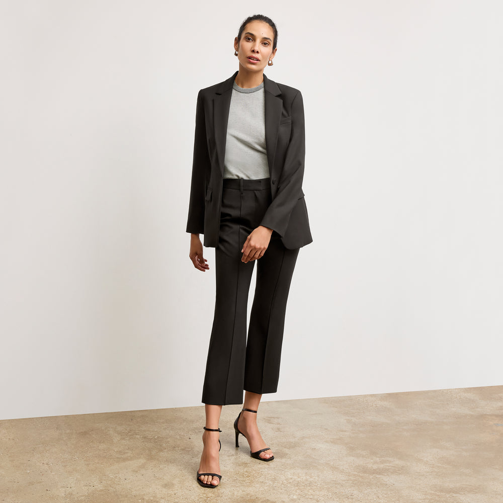front image of a woman wearing the tessa pant in black