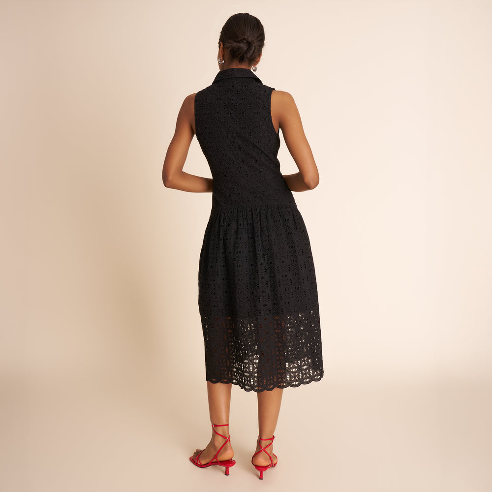 woman in black dress from back