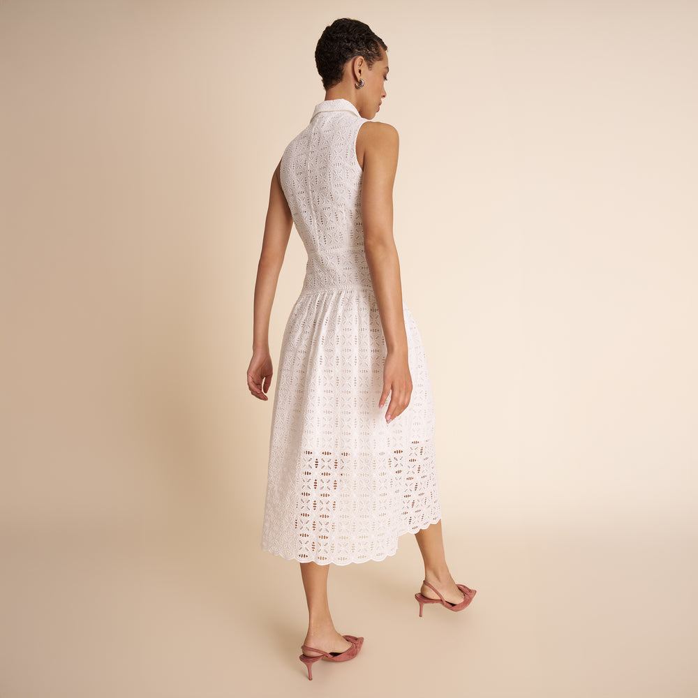back of woman in white dress