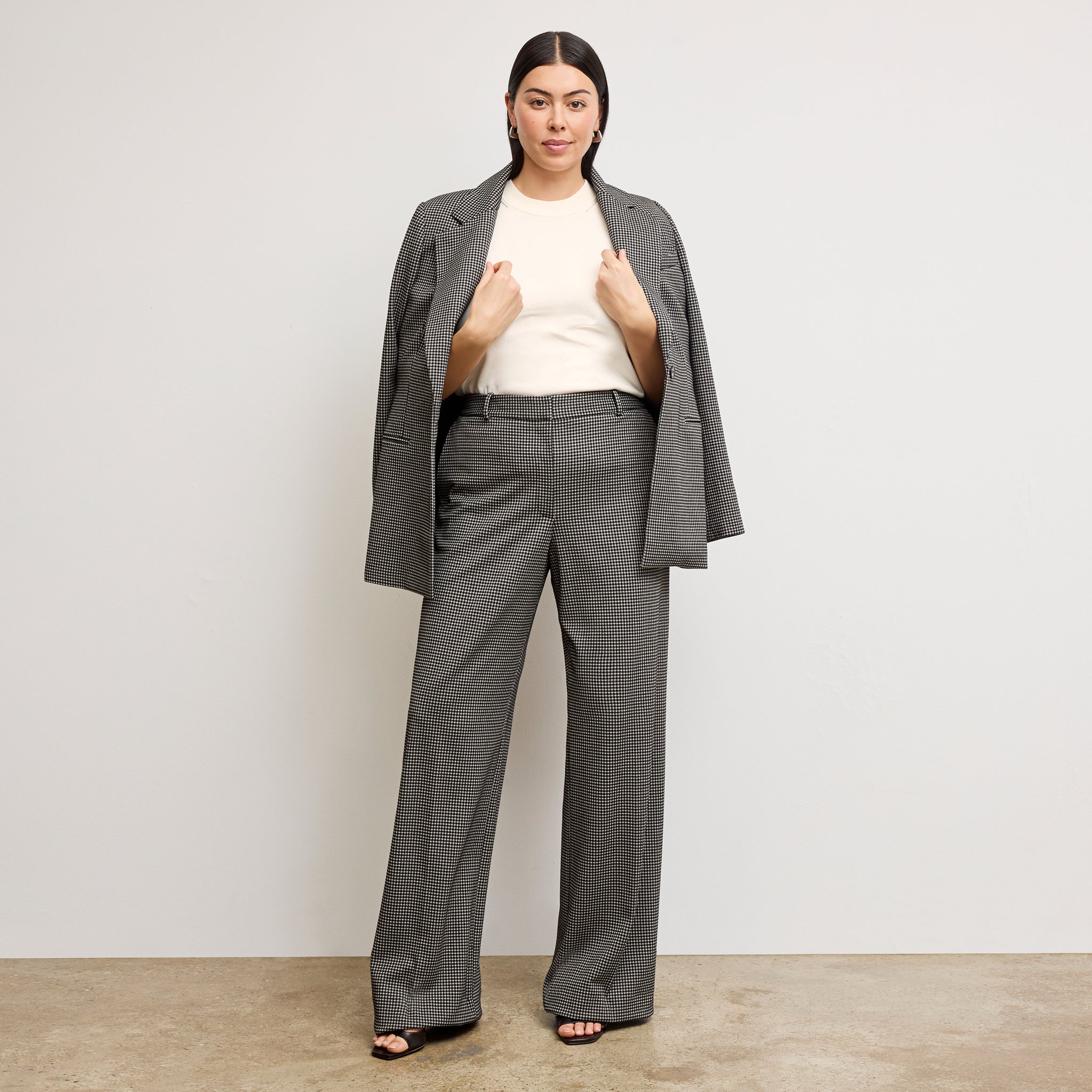 front image of a woman wearing the Tinsley Trousers in Classic Check 