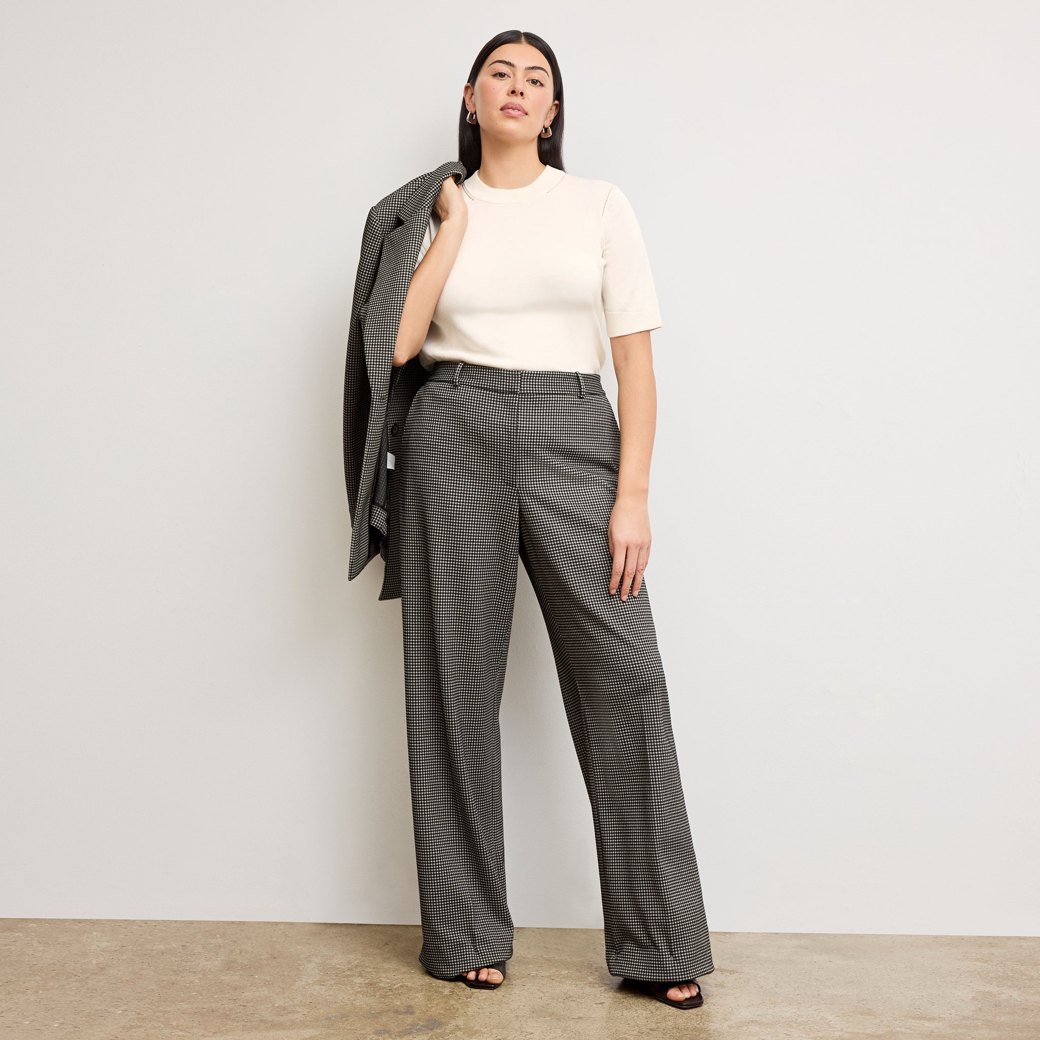 front image of a woman wearing the Tinsley Trousers in Classic Check 