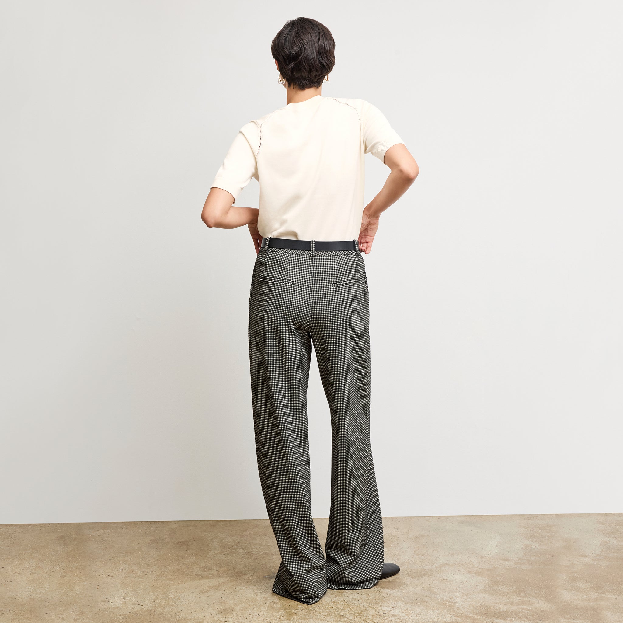 back image of a woman wearing the Tinsley Trousers in Classic Check 