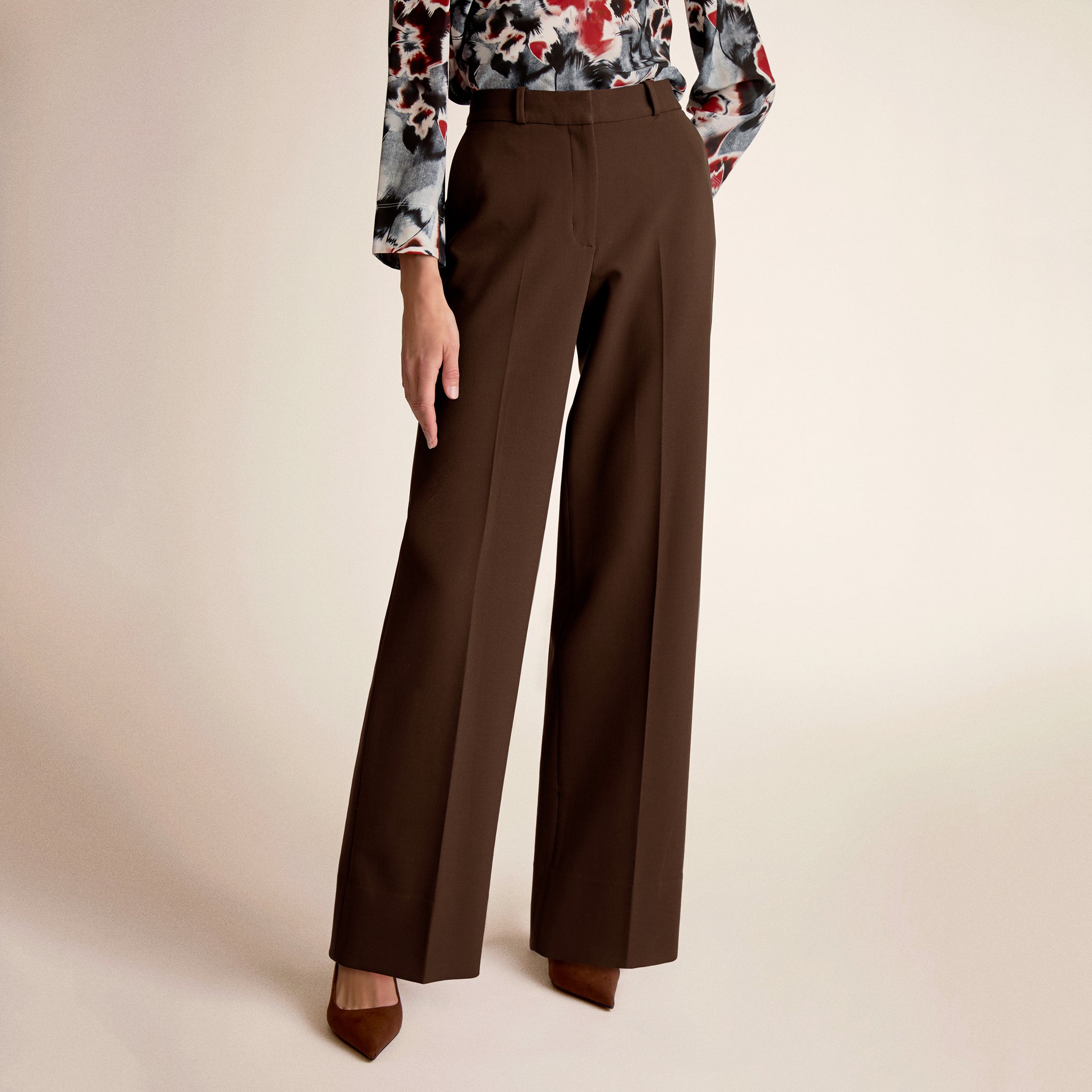 A woman wearing brown pants 