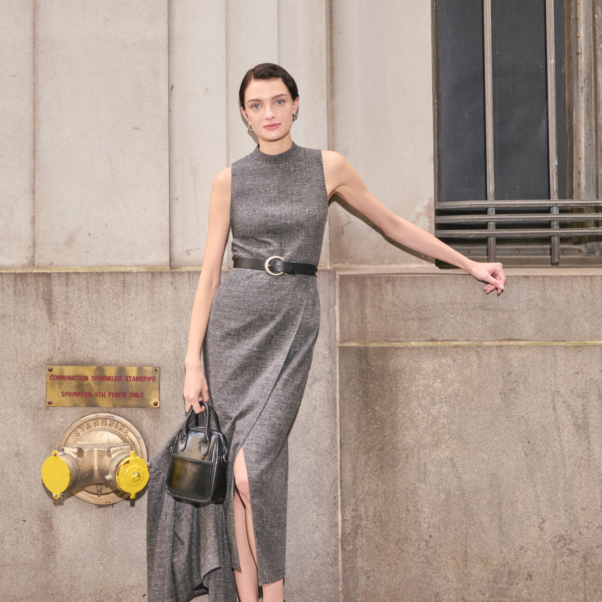 image of a woman wearing the valencia dress in black/white 