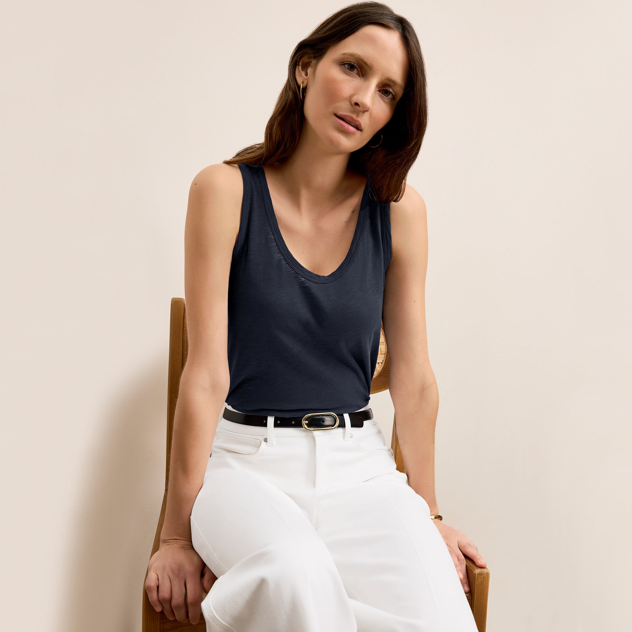 front image of a woman wearing the milo jeans in white