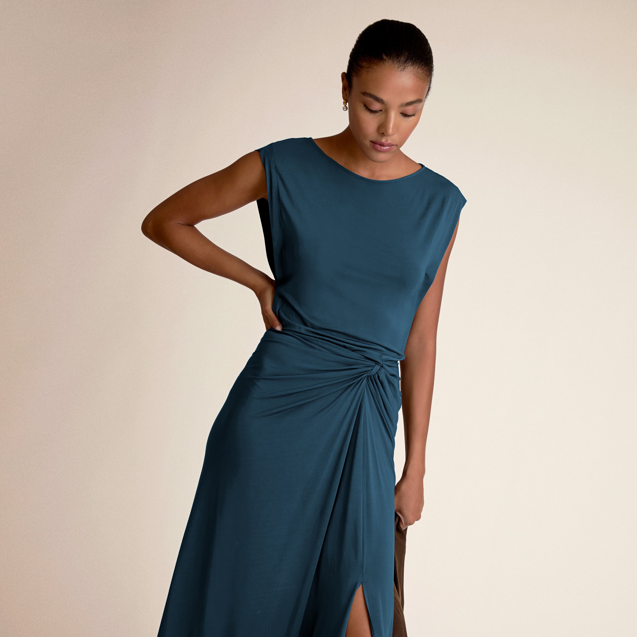 Woman wearing zita dress in moroccan blue