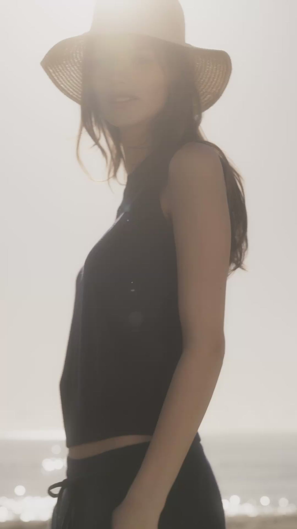 woman in navy blue set.