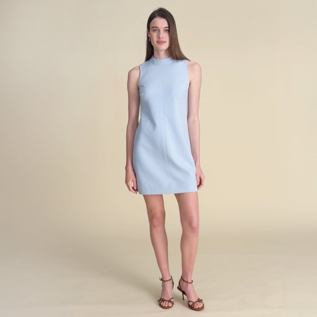 woman in light blue dress