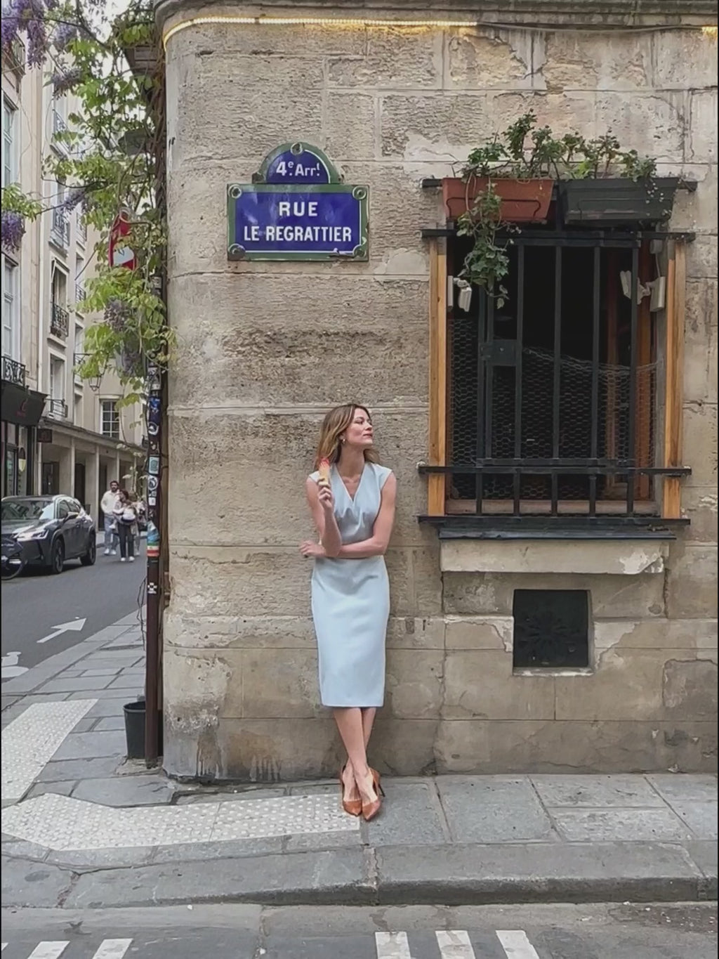 woman in light blue dress.