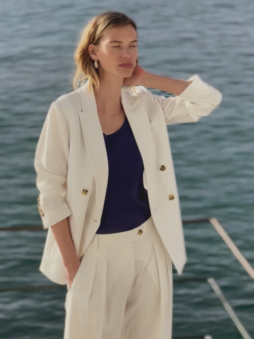 woman in white suiting. 