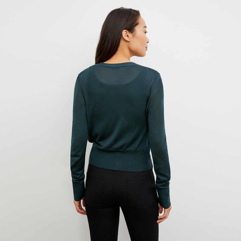 Back image of a woman wearing the Rory Cardigan - Silk Jersey in Deep Sea
