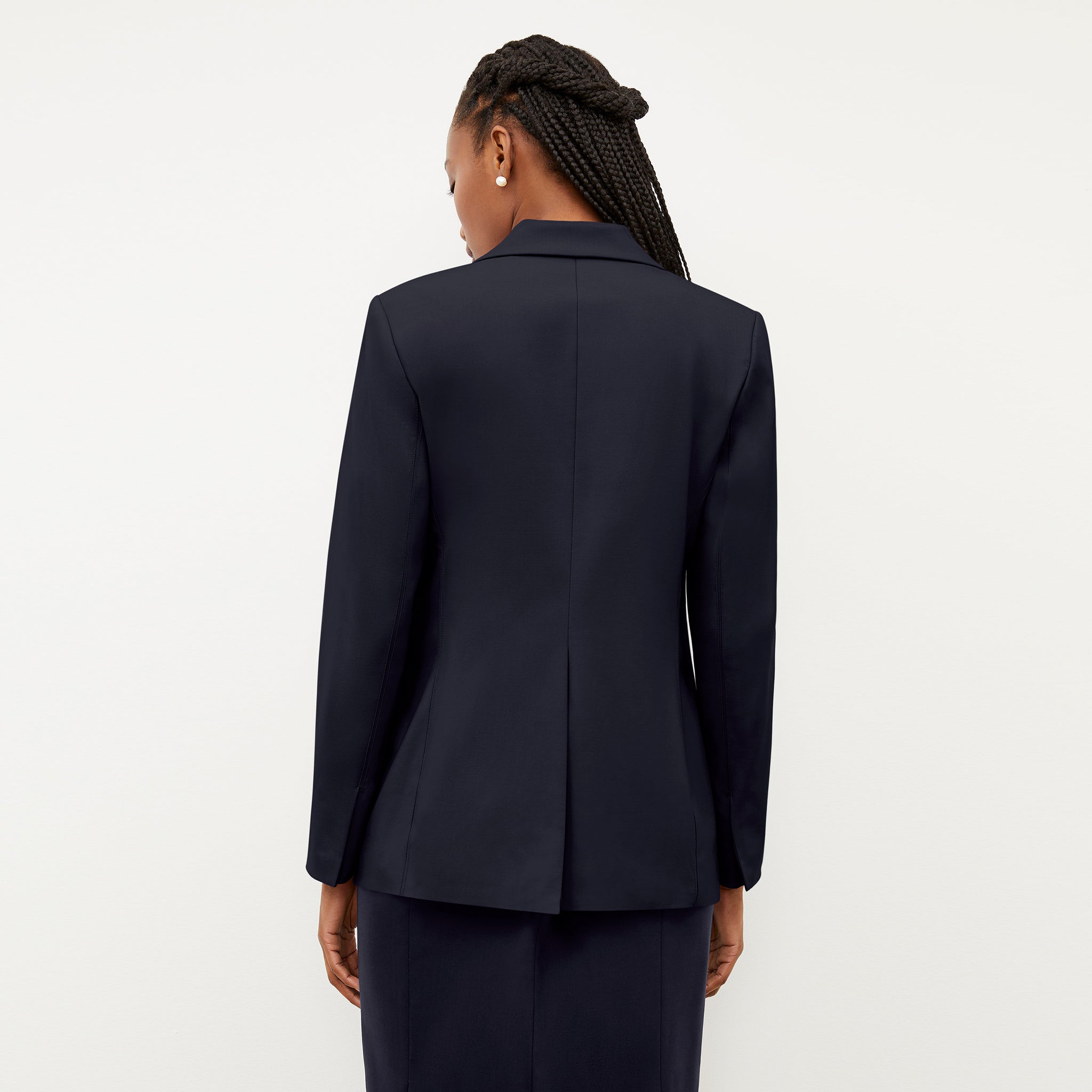 Back image of a woman wearing the Yiyan Blazer in Galaxy Blue