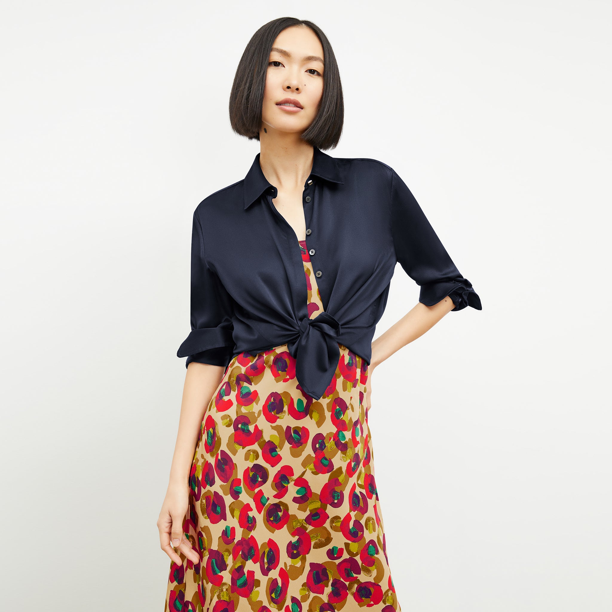 Front image of a woman wearing the Tatum Top in Galaxy Blue