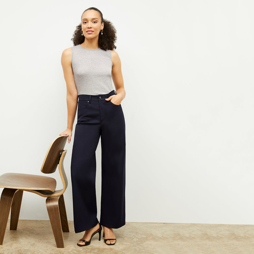 Front image of a woman standing wearing the Milo Jean in ink