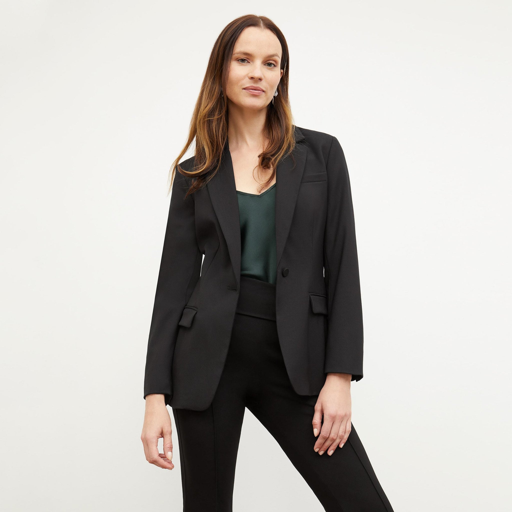 Front image of a woman standing wearing the yiyan blaxer in black